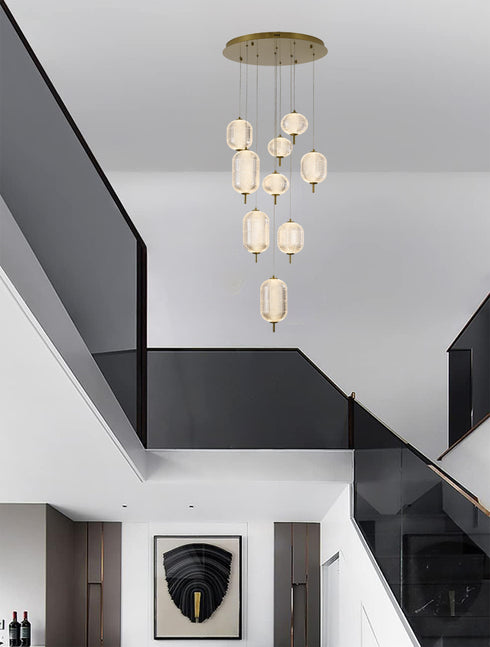 Bethel International 9 Light Flushed in Brass Dimmable LED Chandelier With Hanging Clear PC shades Model: GL454C24BR
