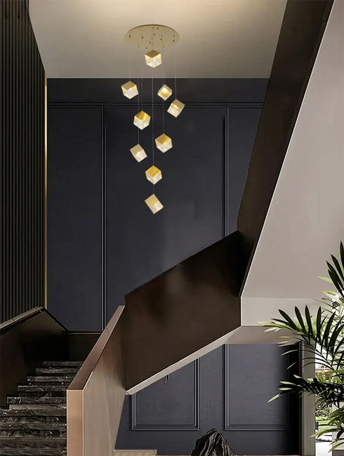 Bethel International 9 Light in Brass Cubed Chandelier With A Clear Distorted Glass Shades Model: GL446C27BR