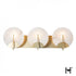 Hubbardton Forge Callisto 3 Light Bath Sconce in Modern Brass Finish Model: 201057-SKT-86-AR